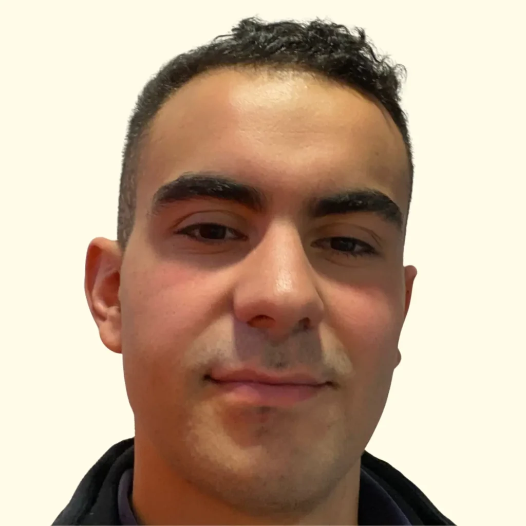 Portrait of a reliable handyman in Zurich with experience in moving, painting, gardening, and furniture assembly.